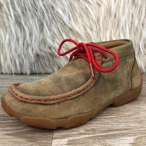 boys driving moccasins